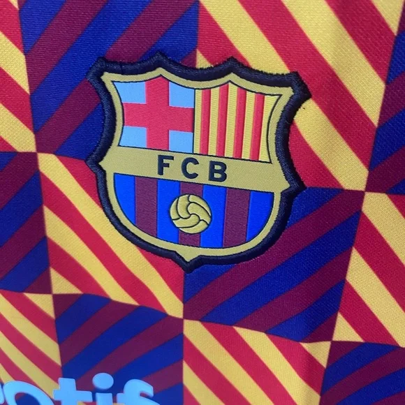 Nike FC Barcelona 2022-23 Youth Pre Match Soccer Jersey Kit.